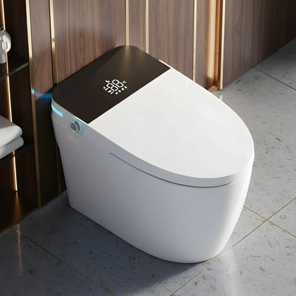 Modern white smart toilet with digital temperature display and control knob in bathroom