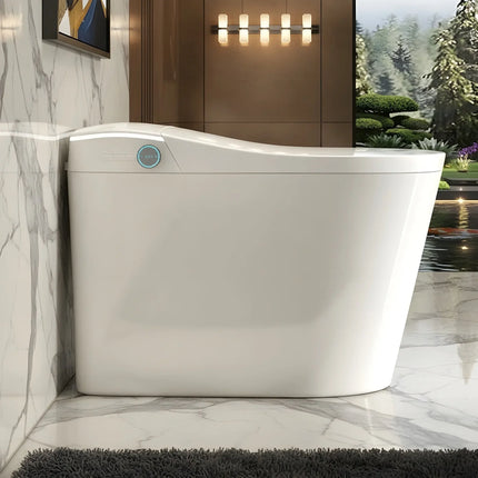 Modern white smart bathtub in a marble bathroom with wall-mounted light and garden view
