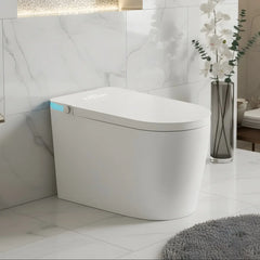 Modern white smart toilet with blue LED light in sleek marble bathroom with flowers and gray rug
