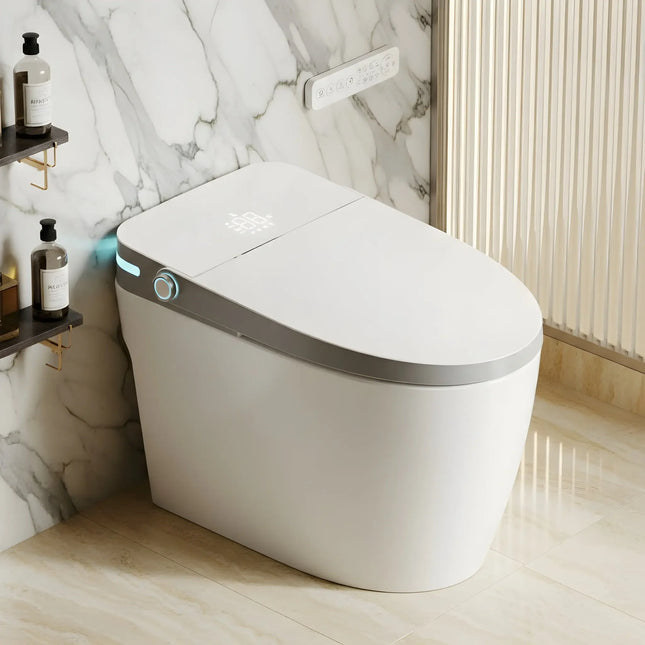 Modern white smart toilet with digital controls installed in marble bathroom